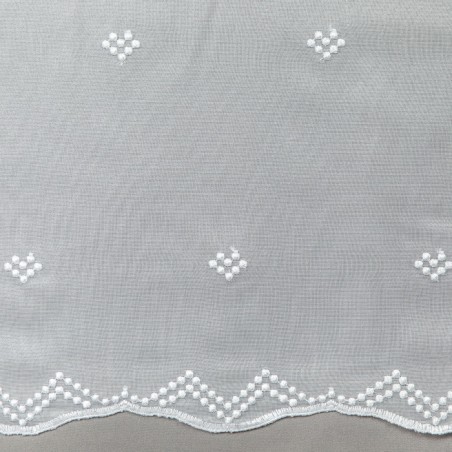 Biała firana haftowana z delikatnym wzorem 280 cm